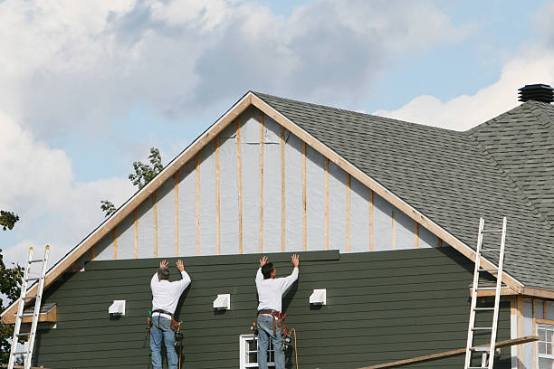Professional Siding Replacement technician working in Wakeman, OH